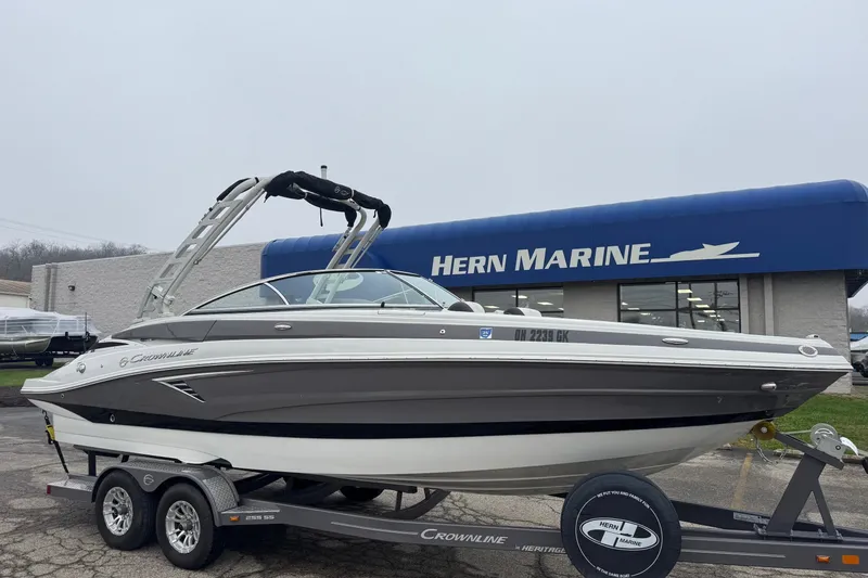 The Image of 2022 Crownline 255 SS boat on trailer at Hern Marine dealership. - 7