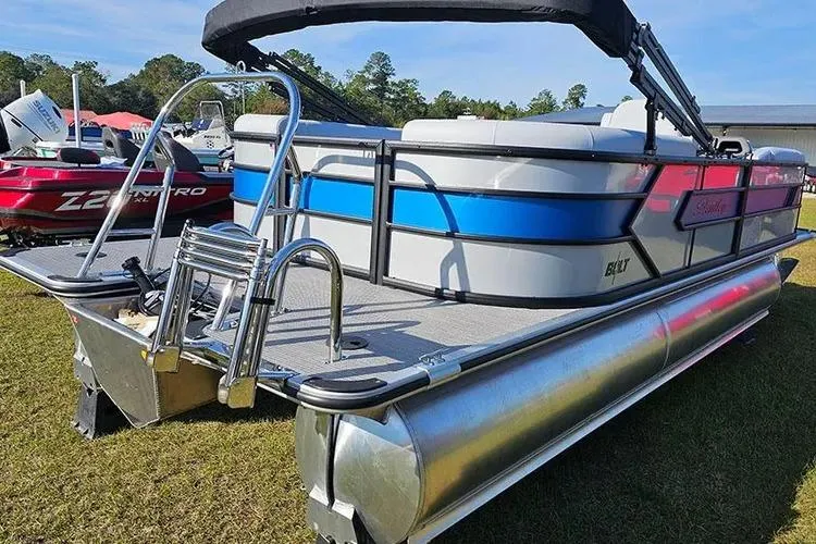 Slide: The Image of 2026 Bentley Pontoons Bolt 223 on grass, showcasing sleek design and modern features. - 18