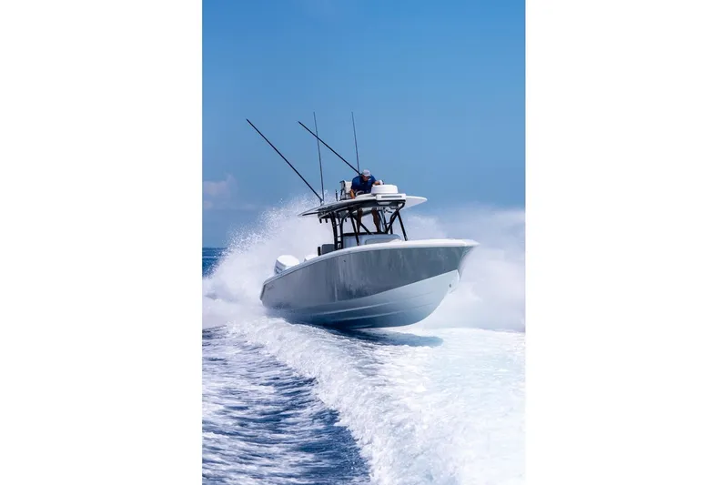 Slide: The Image of 2026 Bahama Boat Works 35 Center Console cruising on open water. - 12