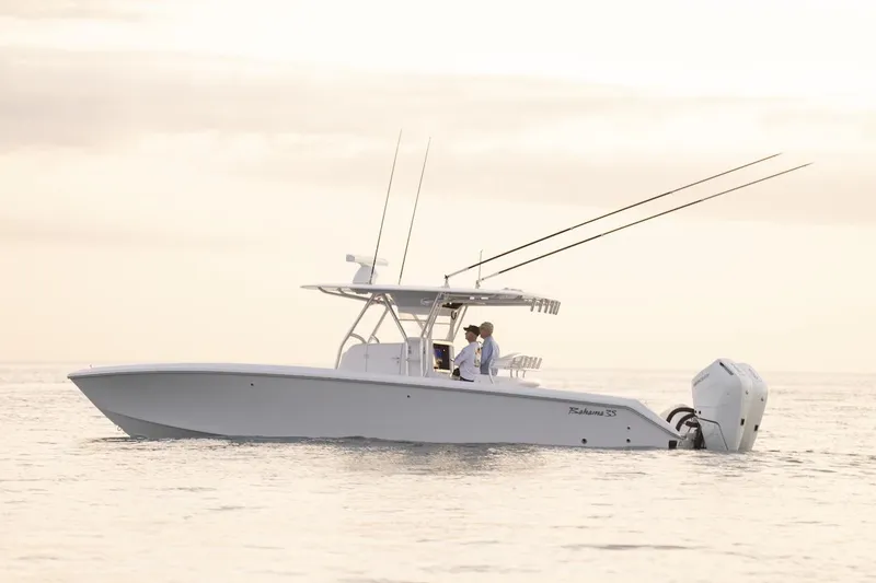 Slide: The Image of 2026 Bahama Boat Works 35 Center Console on calm water at sunset. - 3