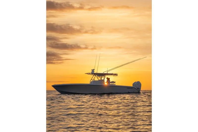 Slide: The Image of 2026 Bahama Boat Works 35 Center Console at sunset on the ocean. - 5