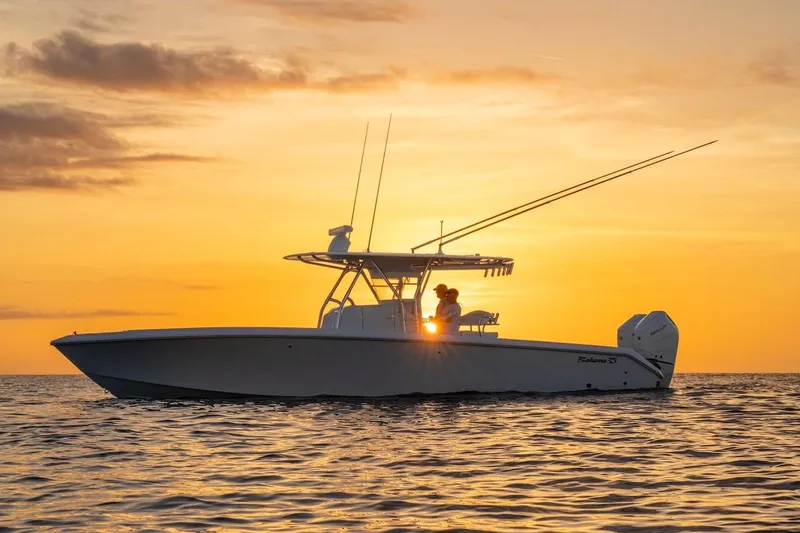Slide: The Image of 2026 Bahama Boat Works 35 Center Console at sunset on the ocean. - 6