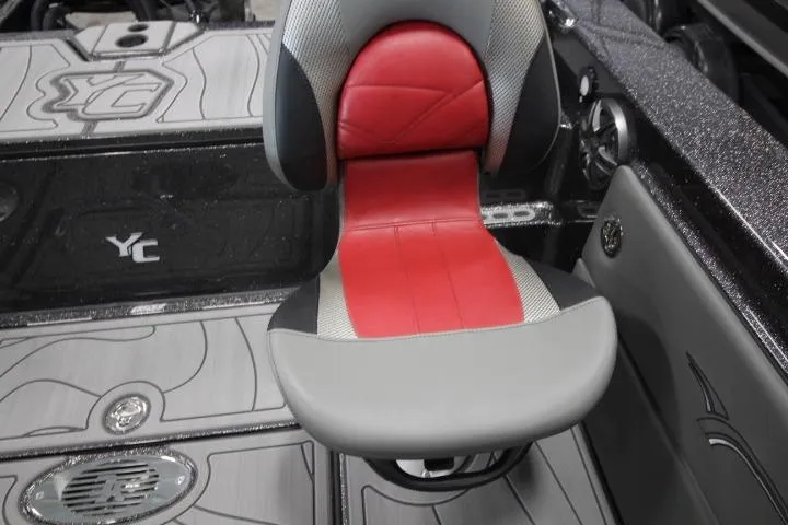 Slide: The Image of 2026 Yar-Craft 210 TFX boat interior with red and gray seating. - 16