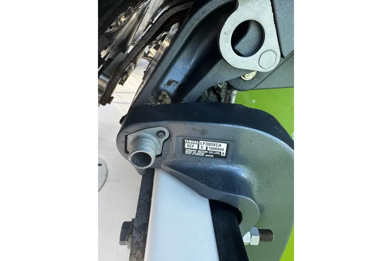Slide: The Image of Close-up of a Yamaha motor part on a 2015 Edgewater 320CC boat. - 34