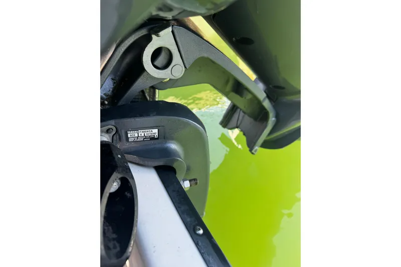 Slide: The Image of Close-up of a Yamaha F300XCA engine on a 2015 Edgewater 320CC boat. - 35