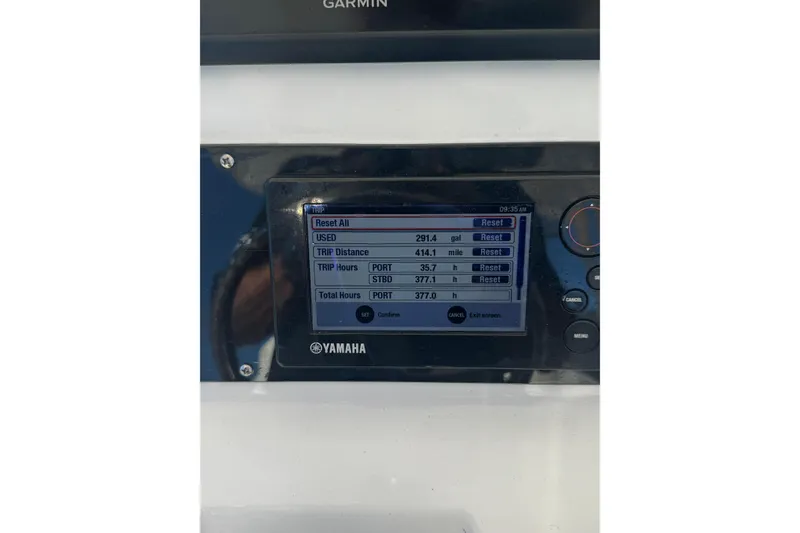 Slide: The Image of Yamaha display on 2015 Edgewater 320CC showing trip data and fuel usage. - 5