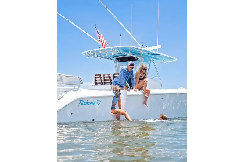 Slide: The Image of People enjoying a day on a 2026 Bahama 37 Center Console boat. - 9