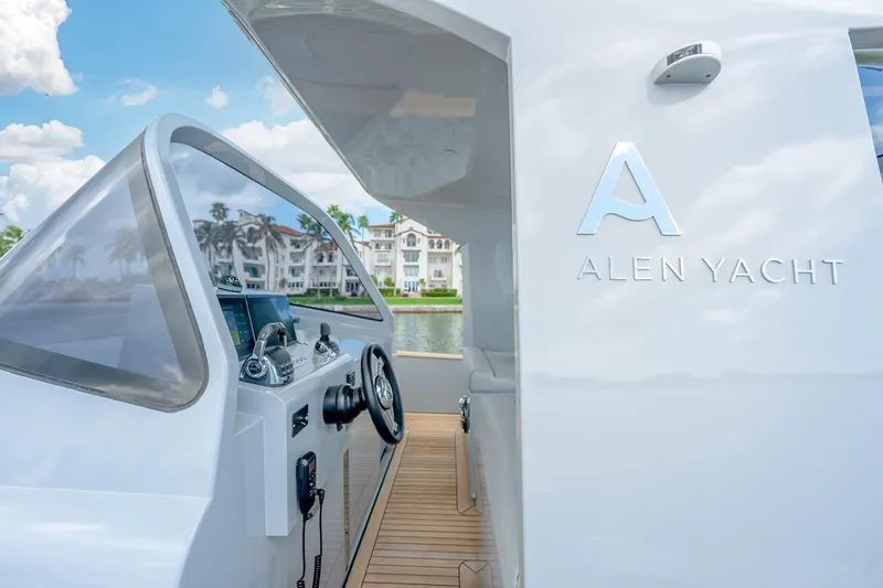 Slide: The Image of Modern Alen 55 yacht cockpit, 2021 model, with sleek design and waterfront view. - 14