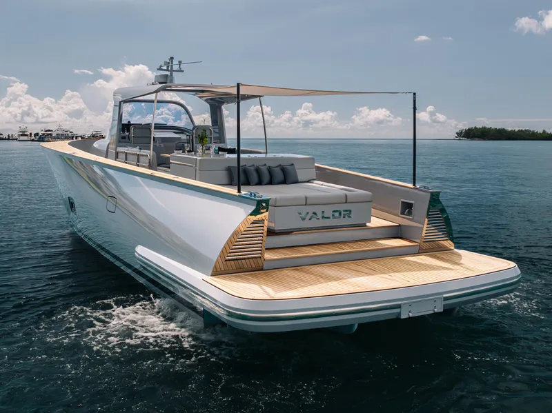 Slide: The Image of Luxury Alen 55 yacht cruising on open water, 2021 model, featuring sleek design and spacious deck. - 3