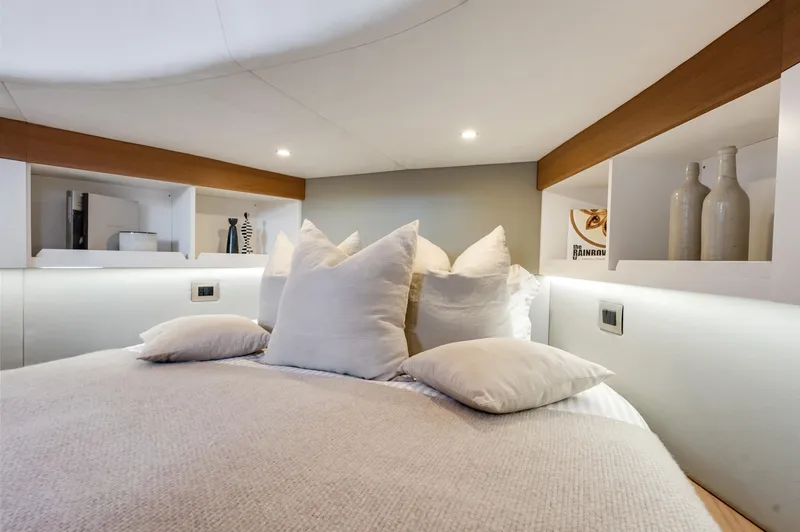 Slide: The Image of Luxurious bedroom interior of 2021 Alen 55 yacht with plush bedding and modern decor. - 30