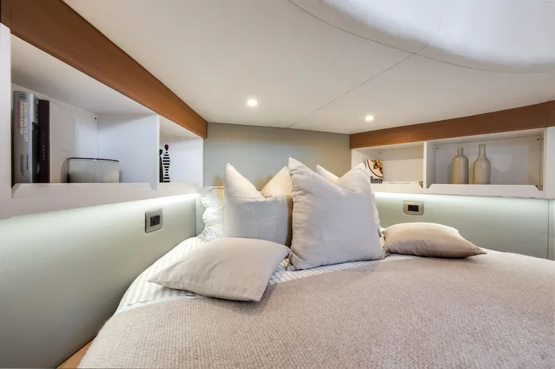 Slide: The Image of Luxurious bedroom interior of 2021 Alen 55 yacht with cozy bedding and ambient lighting. - 31