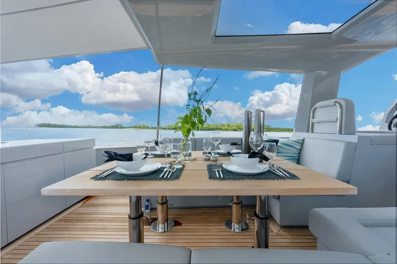 Slide: The Image of Luxurious dining setup on 2021 Alen 55 yacht with ocean view. - 37