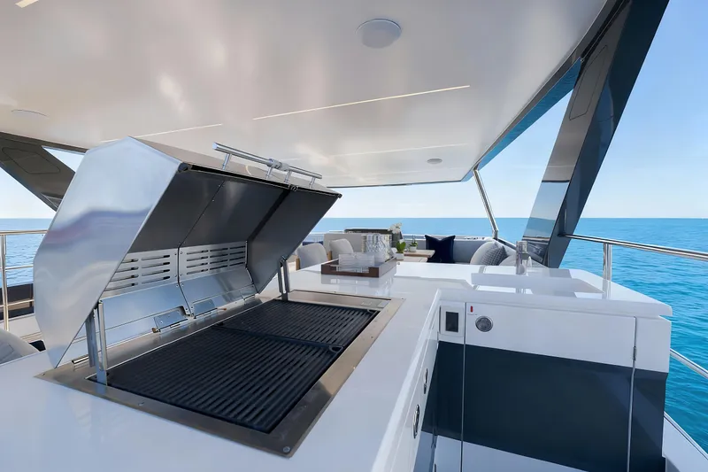 Slide: The Image of Luxury Oceanwalker S60 yacht with outdoor grill and ocean view, 2026 model. - 10