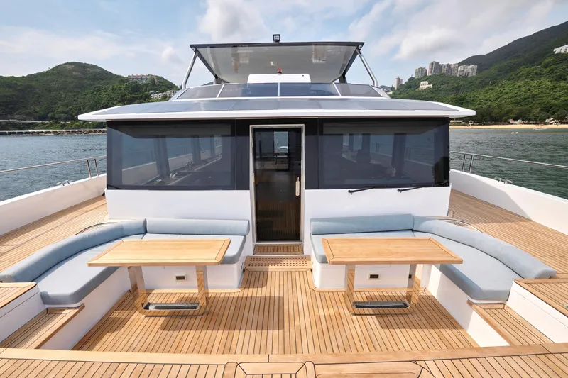 Slide: The Image of Luxurious 2025 Skywalker S60 yacht with spacious deck and seating area. - 13