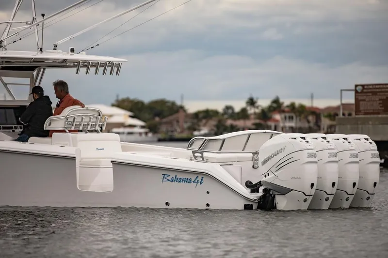 Slide: The Image of 2026 Bahama 41 Center Console boat with multiple Mercury engines on the water. - 24