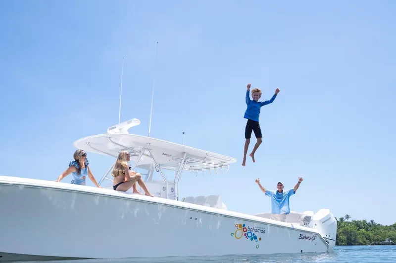 Slide: The Image of People enjoying a day on a 2026 Bahama 41 Center Console boat. - 28