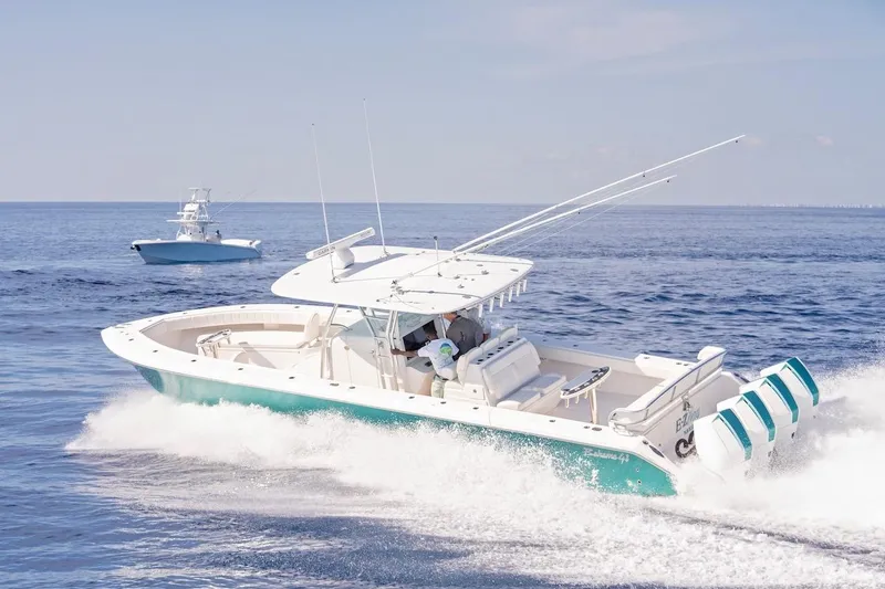 Slide: The Image of 2026 Bahama 41 Center Console boat cruising on open water. - 6