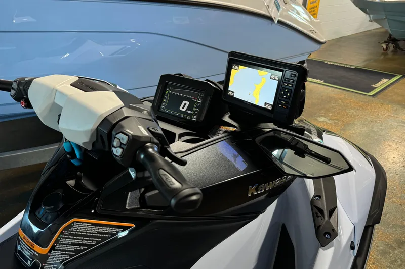 Slide: The Image of 2025 Kawasaki Ultra 160LX-S Angler dashboard with navigation display and controls. - 3