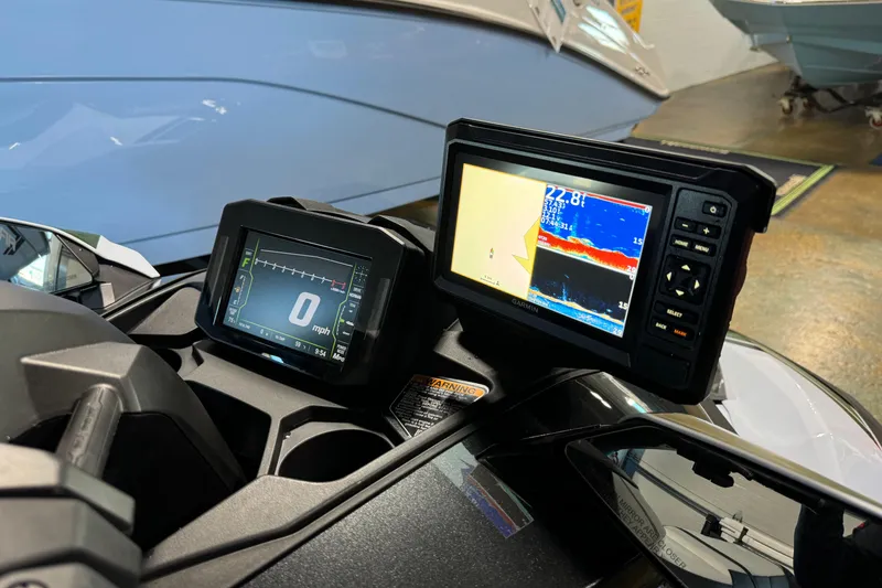 Slide: The Image of Dashboard of 2025 Kawasaki Ultra 160LX-S Angler with digital displays and navigation system. - 4