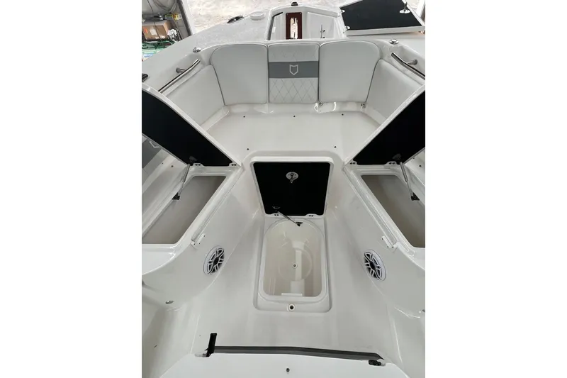 Slide: The Image of 2024 Sea Fox 288 Commander boat interior with open storage compartments. - 3