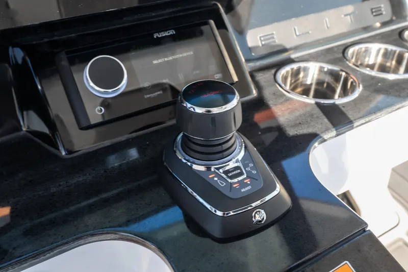Slide: The Image of Control panel of 2026 Monterey Elite 30 OB boat with joystick and audio system. - 39