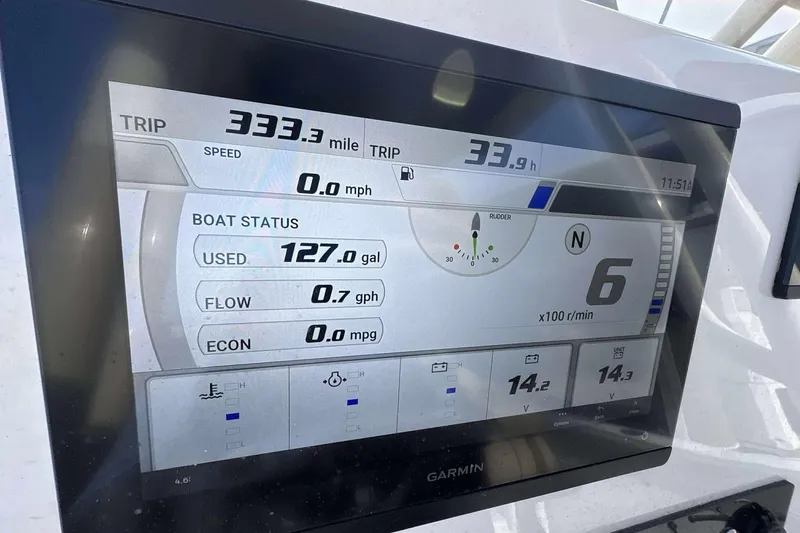 Slide: The Image of Garmin display on 2024 Key West 239 FS showing trip data and boat status. - 12