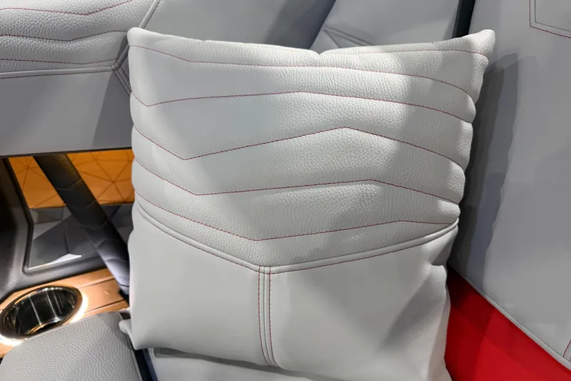 Slide: The Image of Luxurious interior of 2026 Nautique Super Air Nautique G23 with plush leather seating. - 10