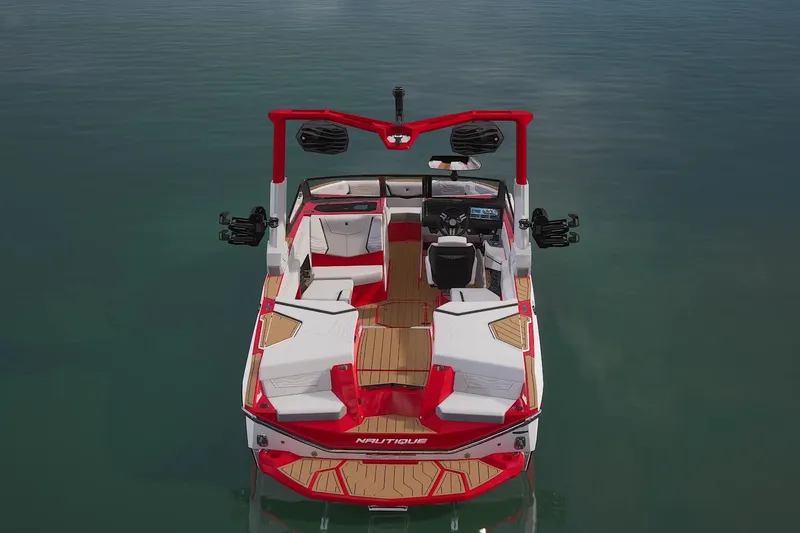 Slide: The Image of 2026 Nautique Super Air Nautique G23 interior with modern steering and seating design. - 5