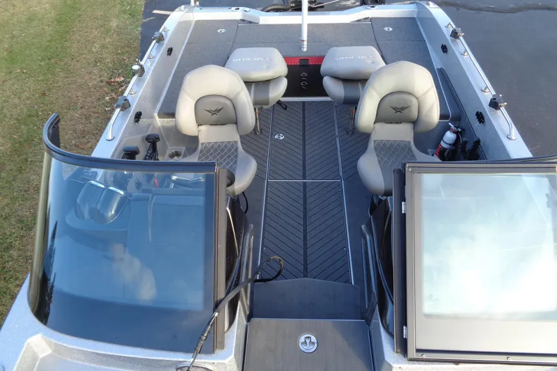 Slide: The Image of 2022 Vexus DVX22 boat interior with seating and windshield, viewed from above. - 15