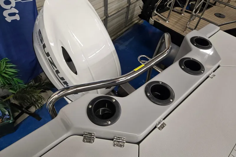 Slide: The Image of 2026 Godfrey Sweetwater 2286 FS boat with Suzuki outboard motor and rod holders. - 17