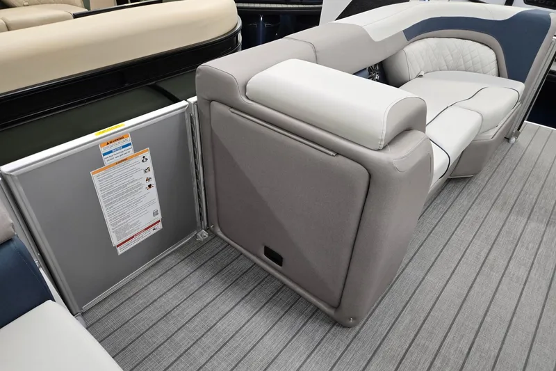 Slide: The Image of 2026 Godfrey Sweetwater 2286 FS boat interior with gray seating and flooring. - 22