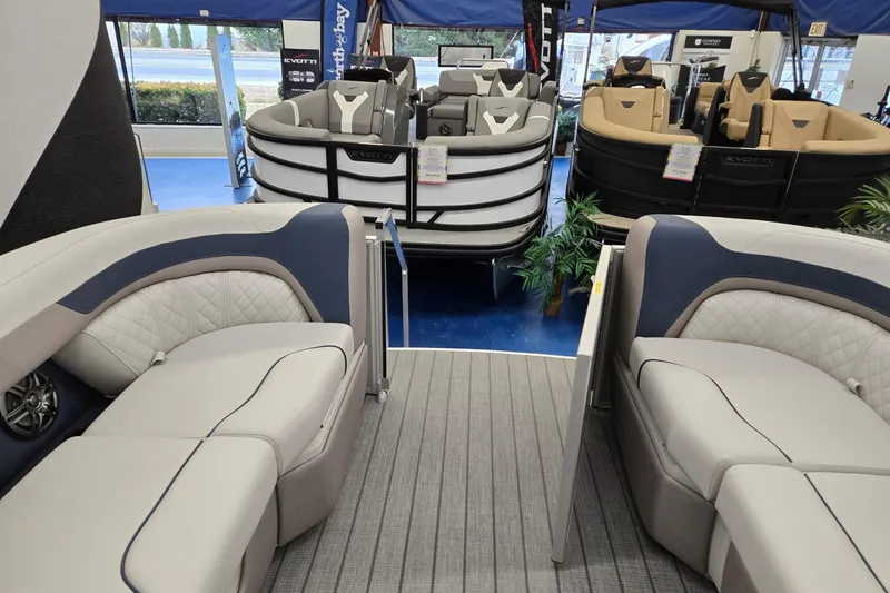 Slide: The Image of Interior view of 2026 Godfrey Sweetwater 2286 FS pontoon boat with luxurious seating. - 24