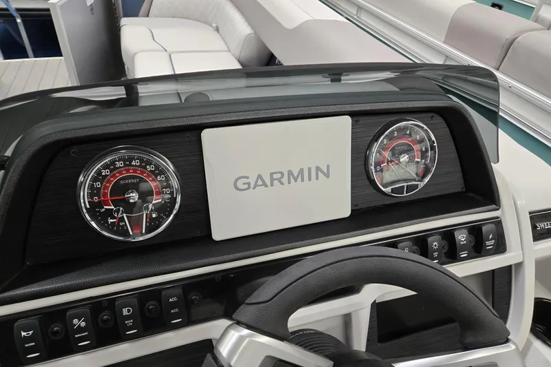 Slide: The Image of 2026 Godfrey Sweetwater 2286 FS dashboard with Garmin display and gauges. - 8