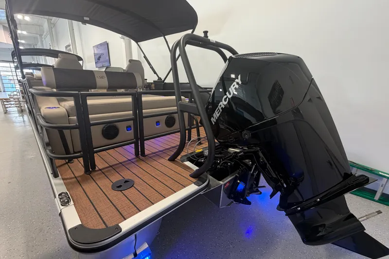Slide: The Image of 2026 Bentley Pontoons Elite 223 Swingback with Mercury engine, showcased indoors. - 6