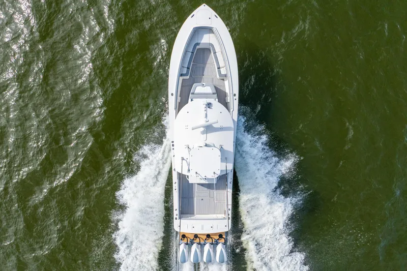 Slide: The Image of Aerial view of 2018 Regulator 41 boat cruising on water. - 23
