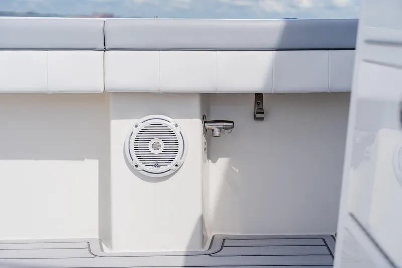 Slide: The Image of 2018 Regulator 41 boat interior with speaker and seating detail. - 52