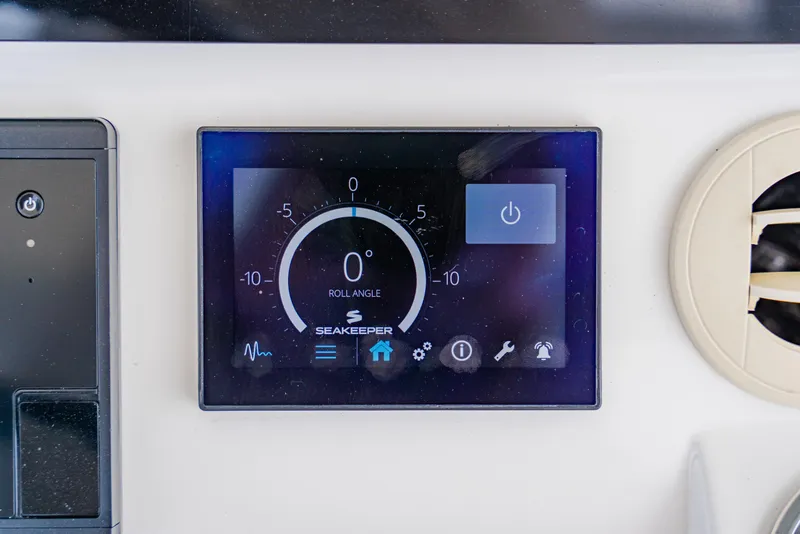 Slide: The Image of Seakeeper control panel on 2018 Regulator 41 boat, displaying roll angle. - 63