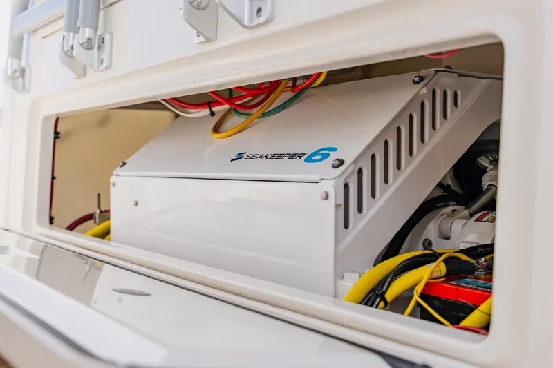 Slide: The Image of Seakeeper 6 gyroscope installed in 2018 Regulator 41 boat, enhancing stability. - 69