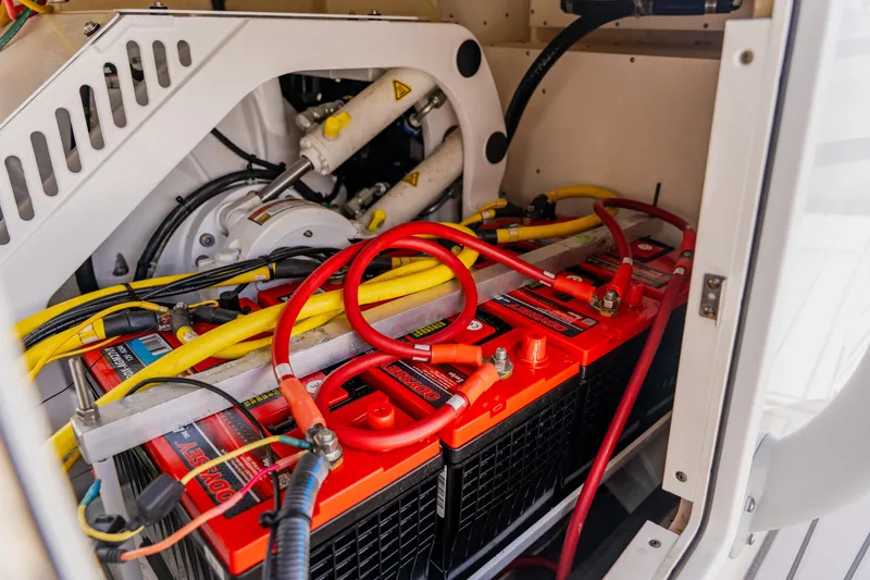 Slide: The Image of Battery compartment of a 2018 Regulator 41 boat with red and yellow cables. - 70