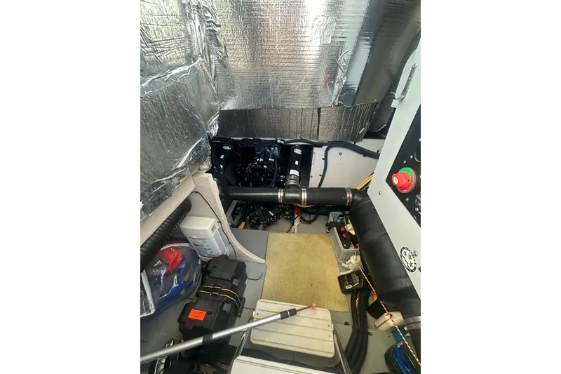 Slide: The Image of Engine room of a 2010 Meridian 391 Sedan yacht with insulation and equipment. - 21