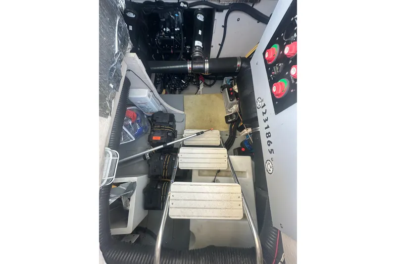 Slide: The Image of Engine room of 2010 Meridian 391 Sedan with visible components and wiring. - 22