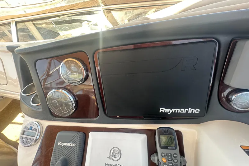 Slide: The Image of Dashboard of 2010 Meridian 391 Sedan with Raymarine navigation equipment. - 31