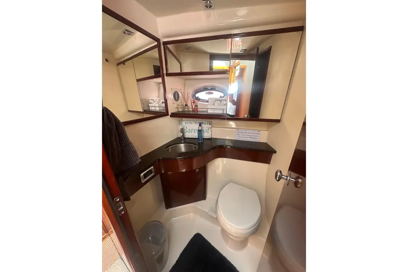 Slide: The Image of Bathroom interior of 2010 Meridian 391 Sedan yacht with sink and toilet. - 9