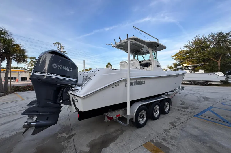 Slide: The Image of 2008 Everglades 290 Center Console boat with Yamaha engine on trailer. - 11