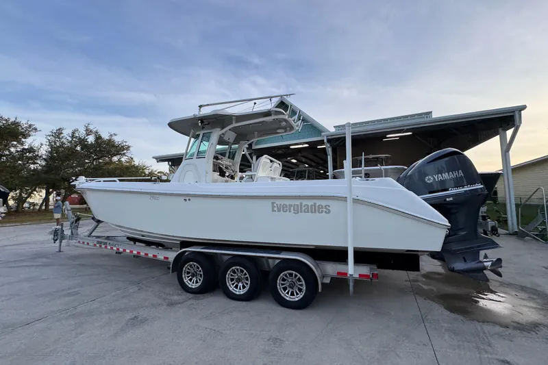 Slide: The Image of 2008 Everglades 290 Center Console boat on trailer with Yamaha engines. - 16