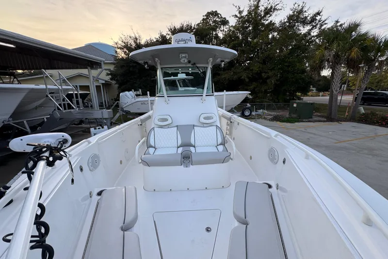 Slide: The Image of 2008 Everglades 290 Center Console boat with spacious seating and modern design. - 24