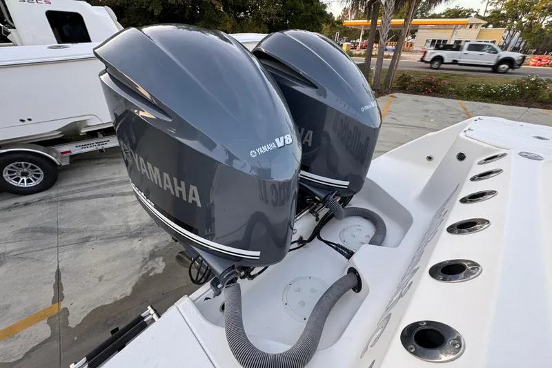 Slide: The Image of Twin Yamaha V8 engines on a 2008 Everglades 290 Center Console boat. - 44