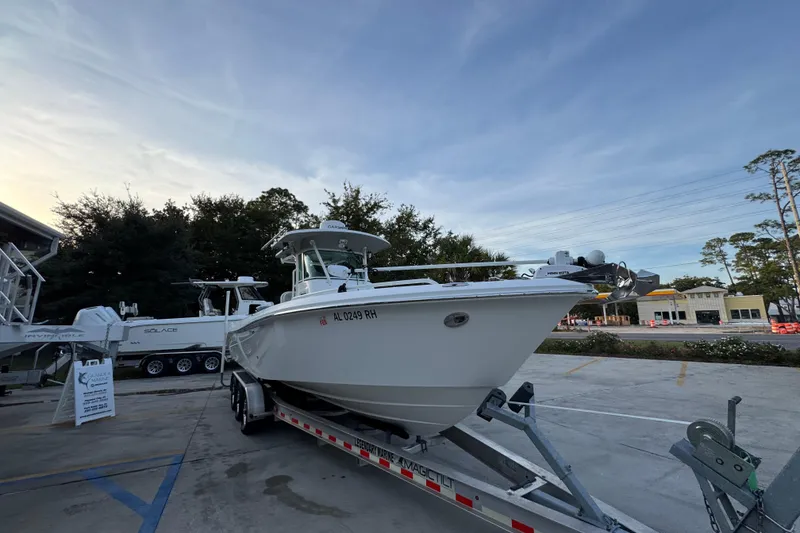 Slide: The Image of 2008 Everglades 290 Center Console boat on trailer in parking lot. - 7
