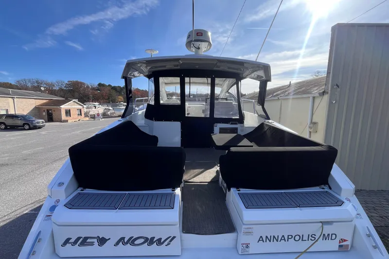 Slide: The Image of 2018 Cruisers Yachts 390 Express Coupe docked in Annapolis, MD under clear skies. - 11