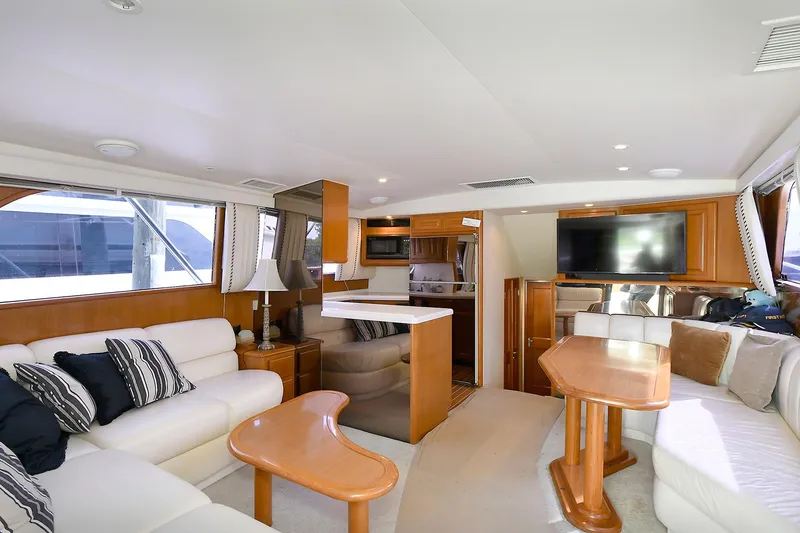 Slide: The Image of Luxurious interior of a 1997 Viking 47 Convertible yacht with elegant seating and modern amenities. - 15